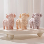 Three pastel standing Highland cow candle castings