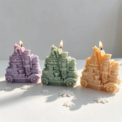 Three toy-train scenes carrying trees, presents and nutcracker figures