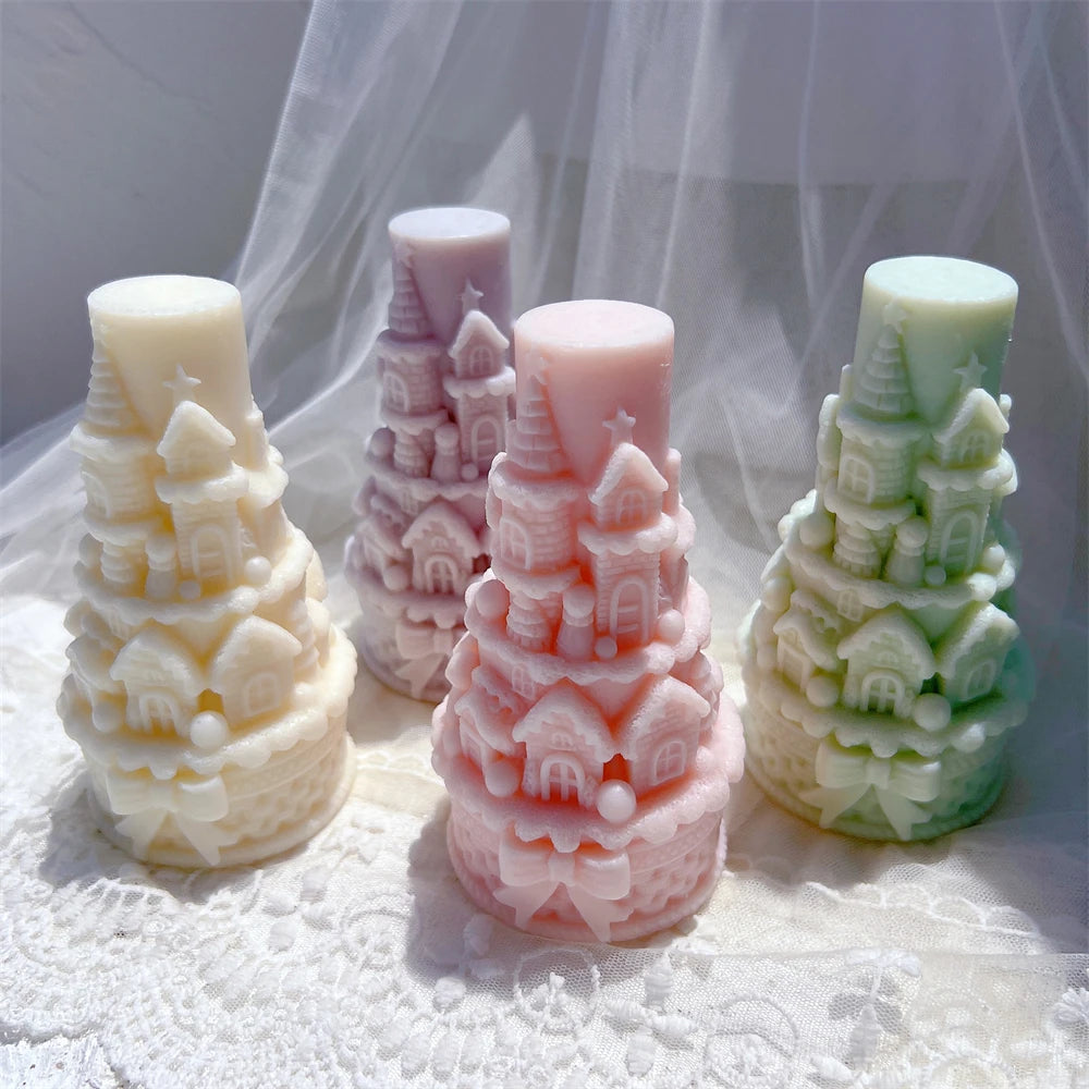 Cream pink and green castle tower candles with patterned base bands