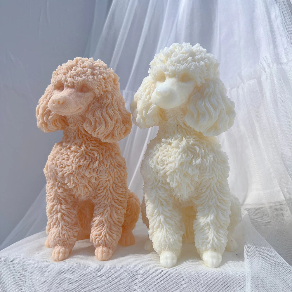 Angled view of poodle castings showing their curly ear detail