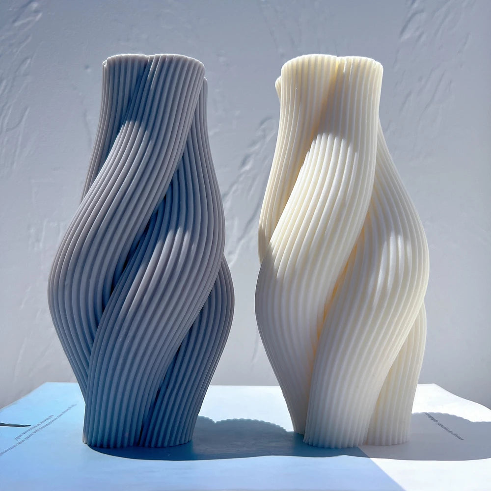 Gray and cream twisted pillar castings