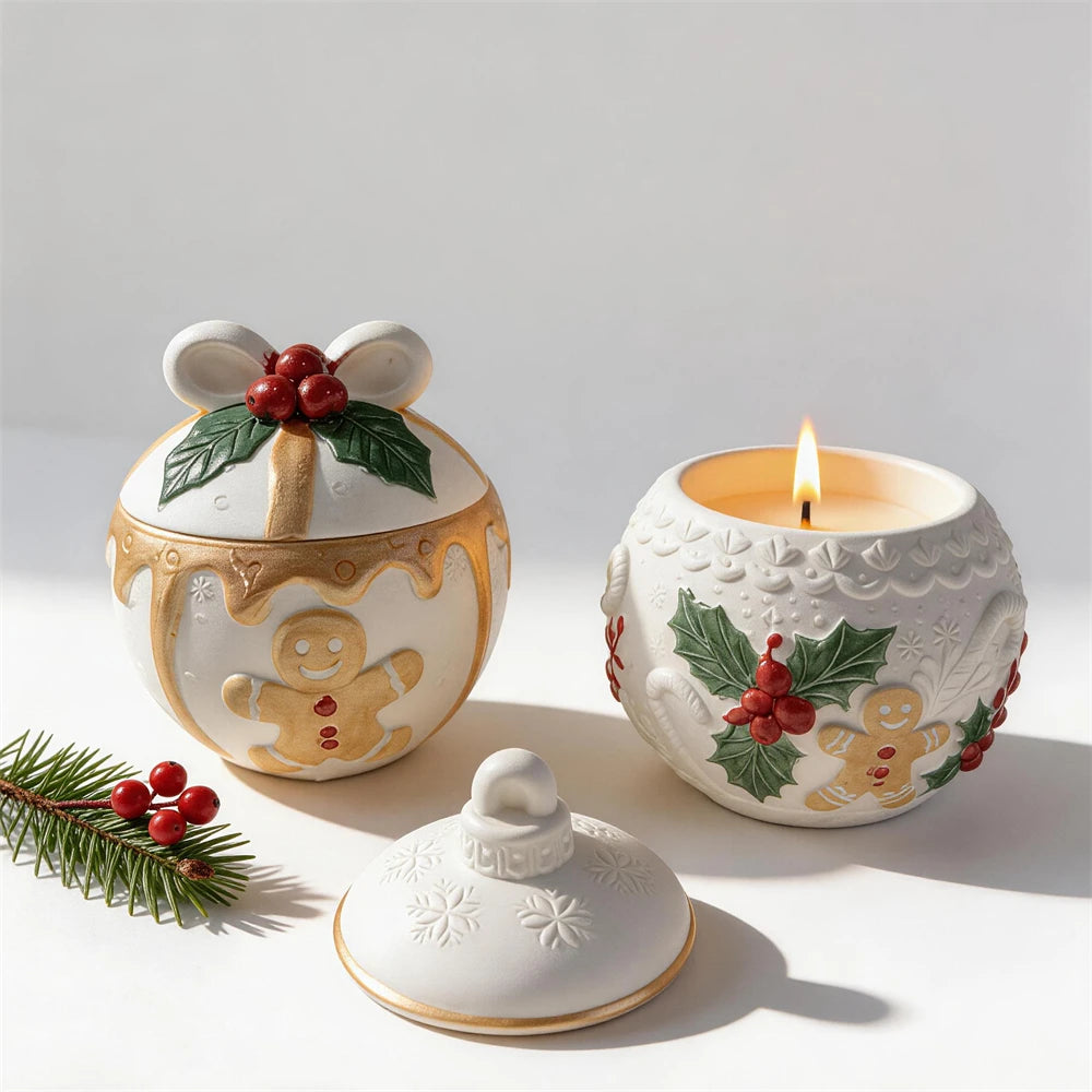 Bow-topped gingerbread vessel beside holly gingerbread container