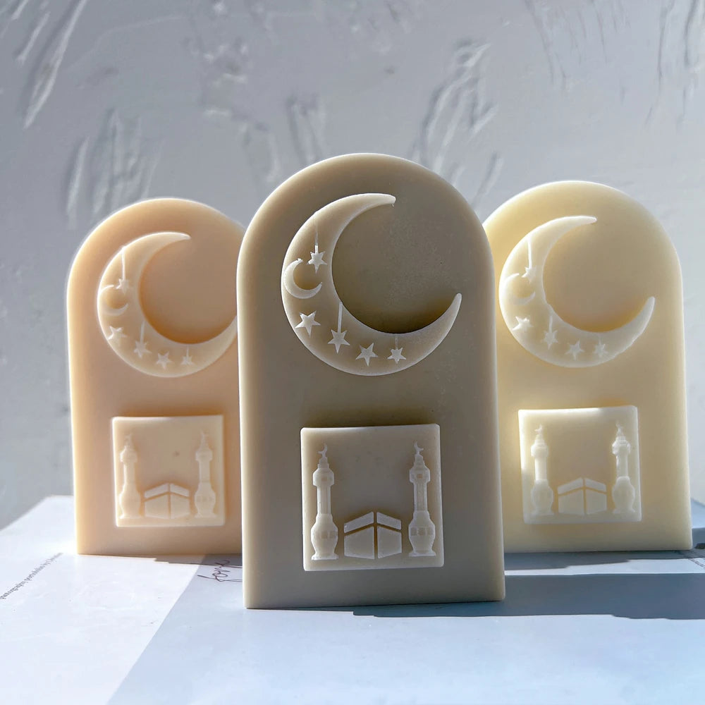 Arched Ramadan candle castings with crescents and architectural panels