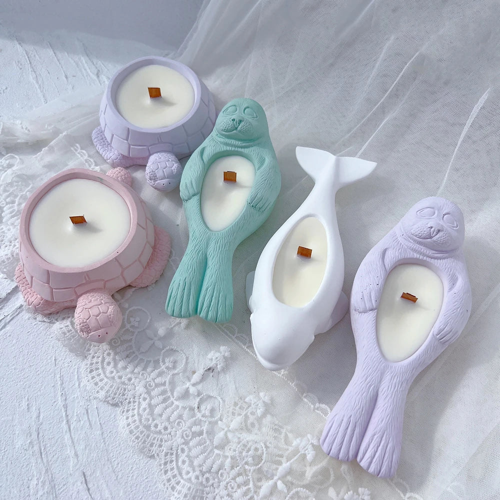 Seal-shaped holders beside round decorative holders
