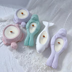 Seal-shaped holders beside round decorative holders