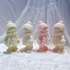 Pastel winter characters with bobble hats and boots
