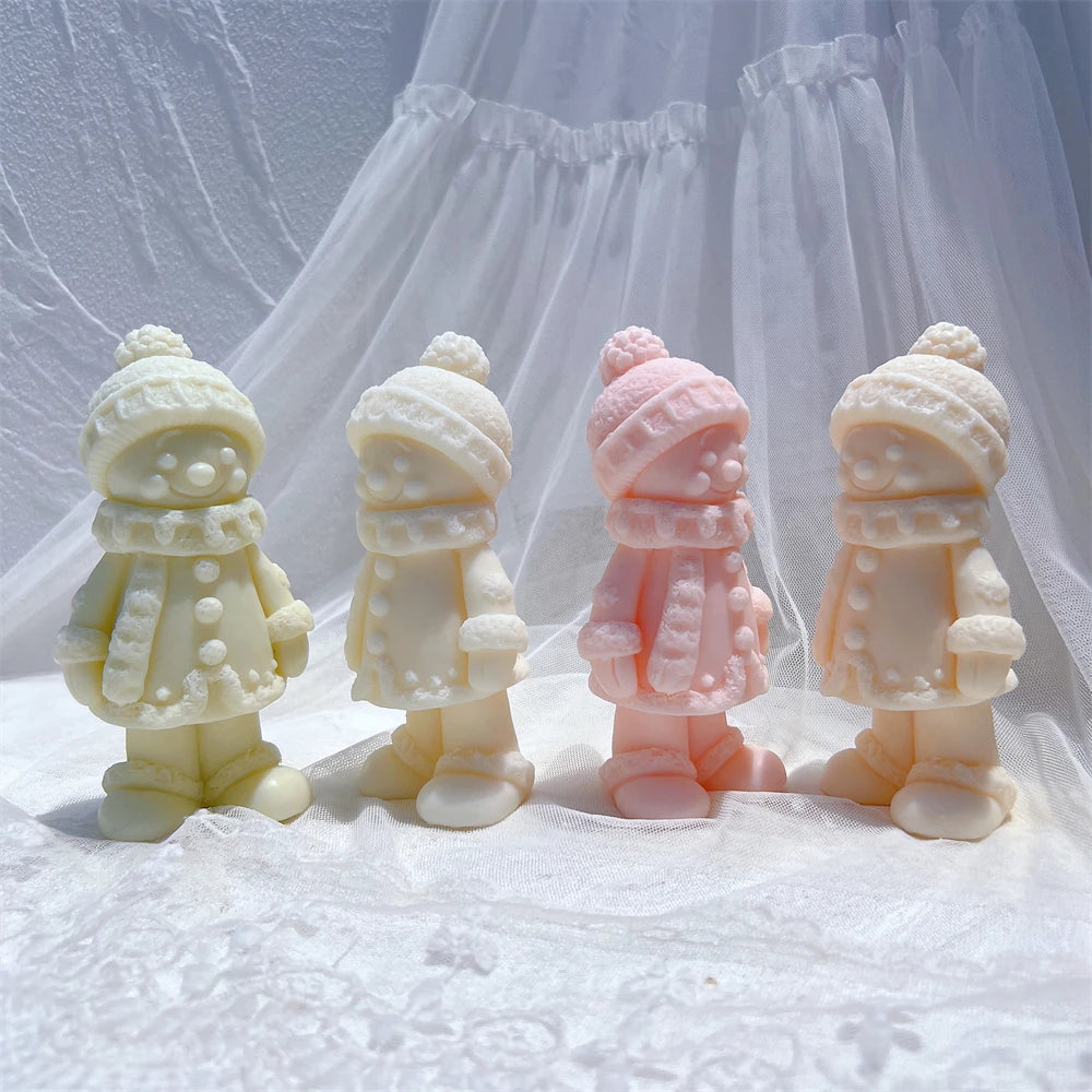 Pastel winter characters with bobble hats and boots