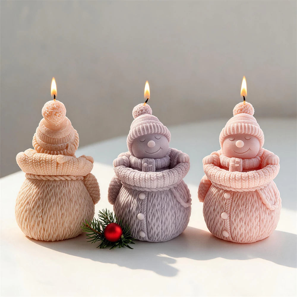 Rear and front views of knitted snowman castings