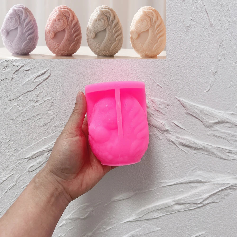Pink silicone mold for horse-head Easter egg with finished sample inset