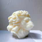 Side profile of white lion-head sculpture showing nose and flowing mane