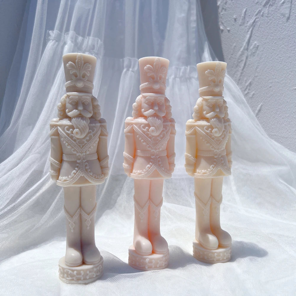 Front view of standing nutcracker figures on round bases