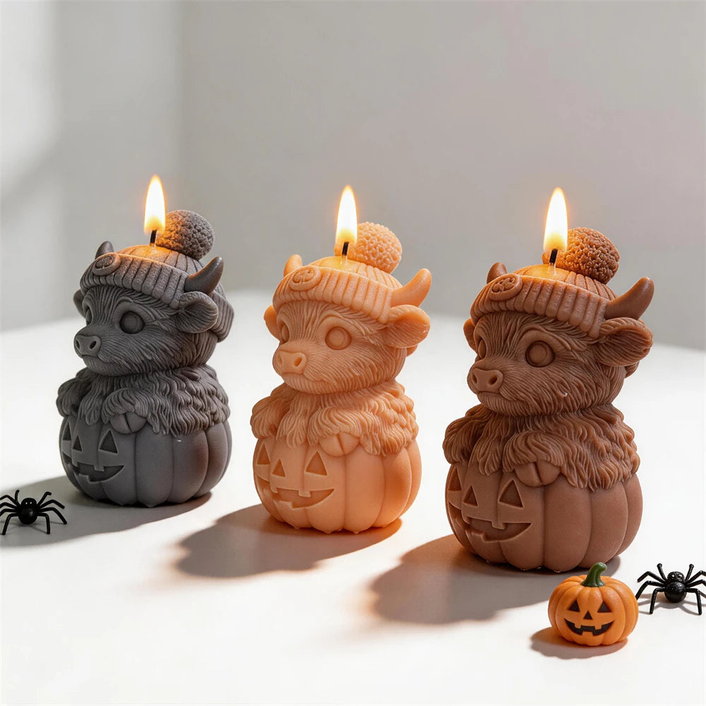 Three hatted cow pumpkin castings with shaggy fur and horns