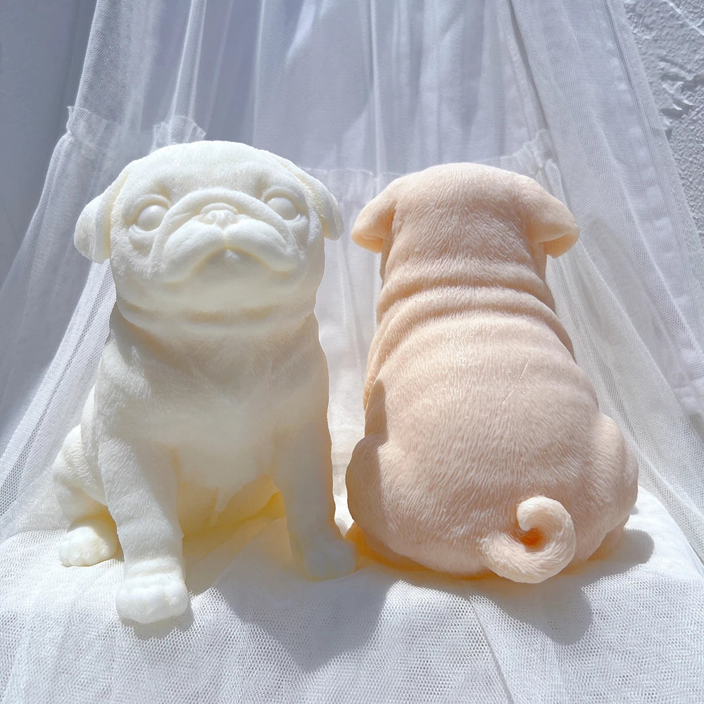 Front and rear views of pug castings with curled tails