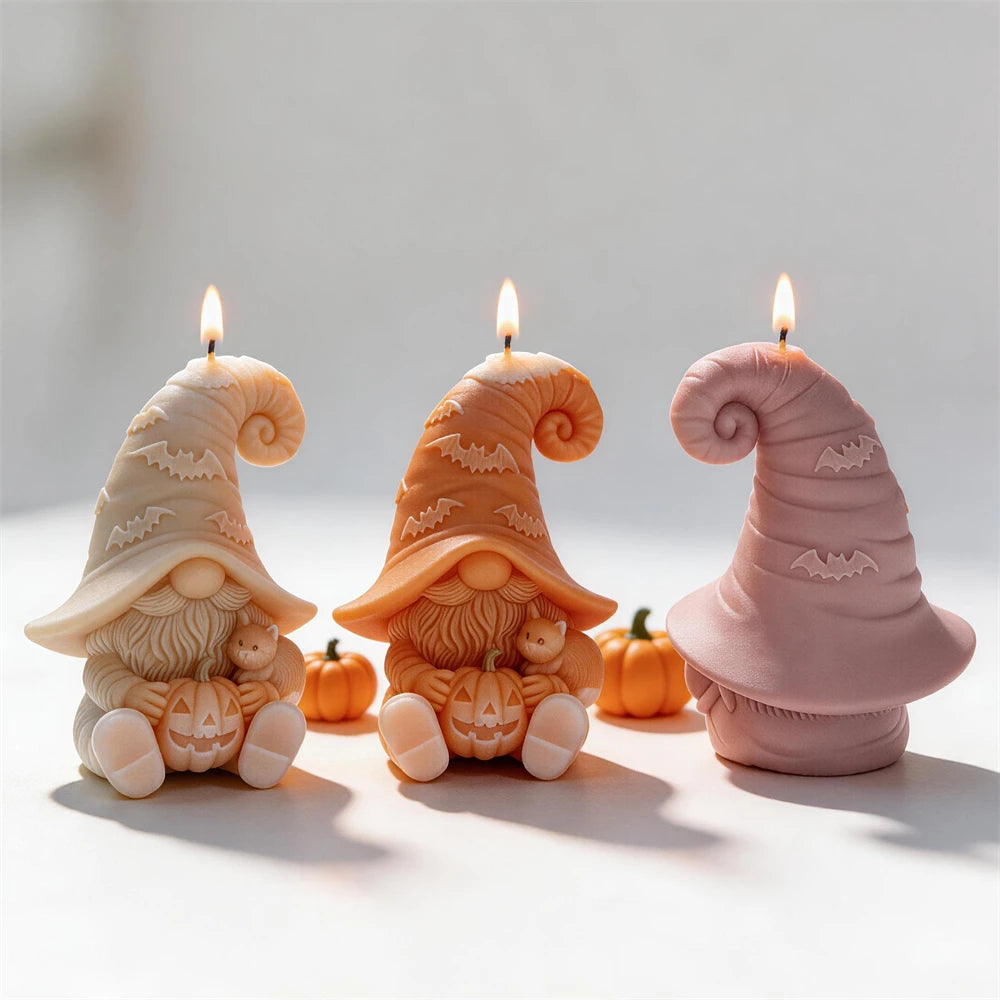 Front and rear views of bat hat gnome candles with curled tips