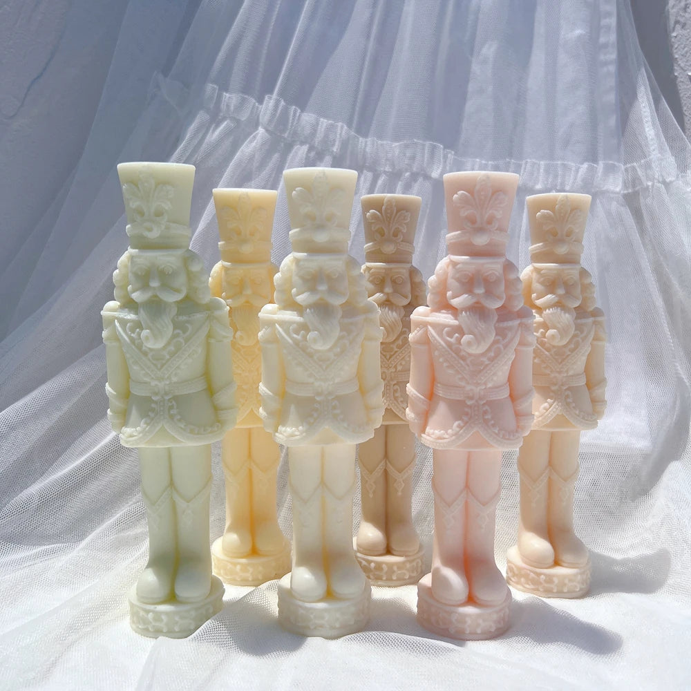 Pastel nutcracker casting group with decorated cylindrical hats