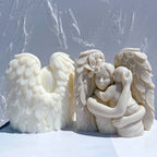 Front and rear views of feathered mother-and-child figures