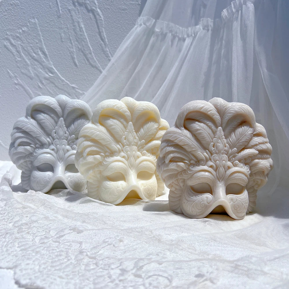 Close-up of sculpted ornamental feather relief on mask castings