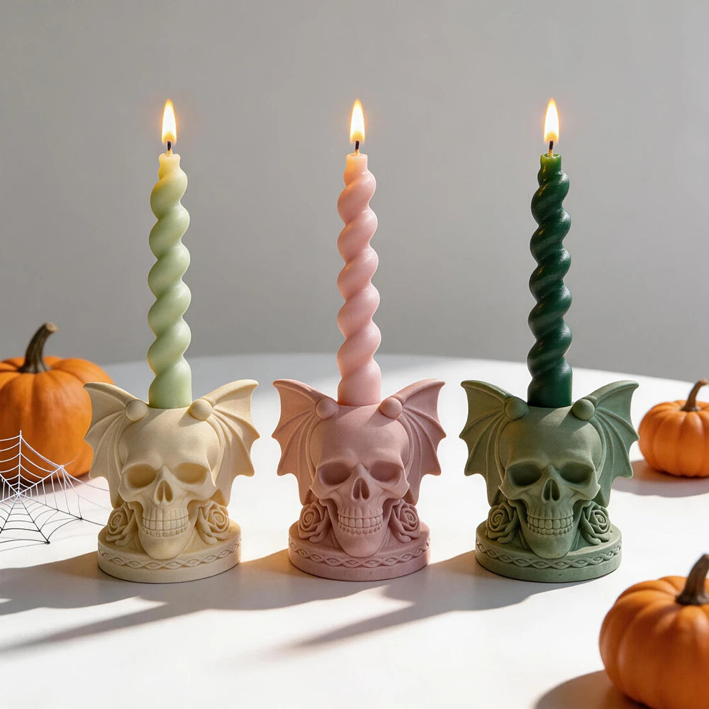 Bat-wing skull holders with twisted taper candles