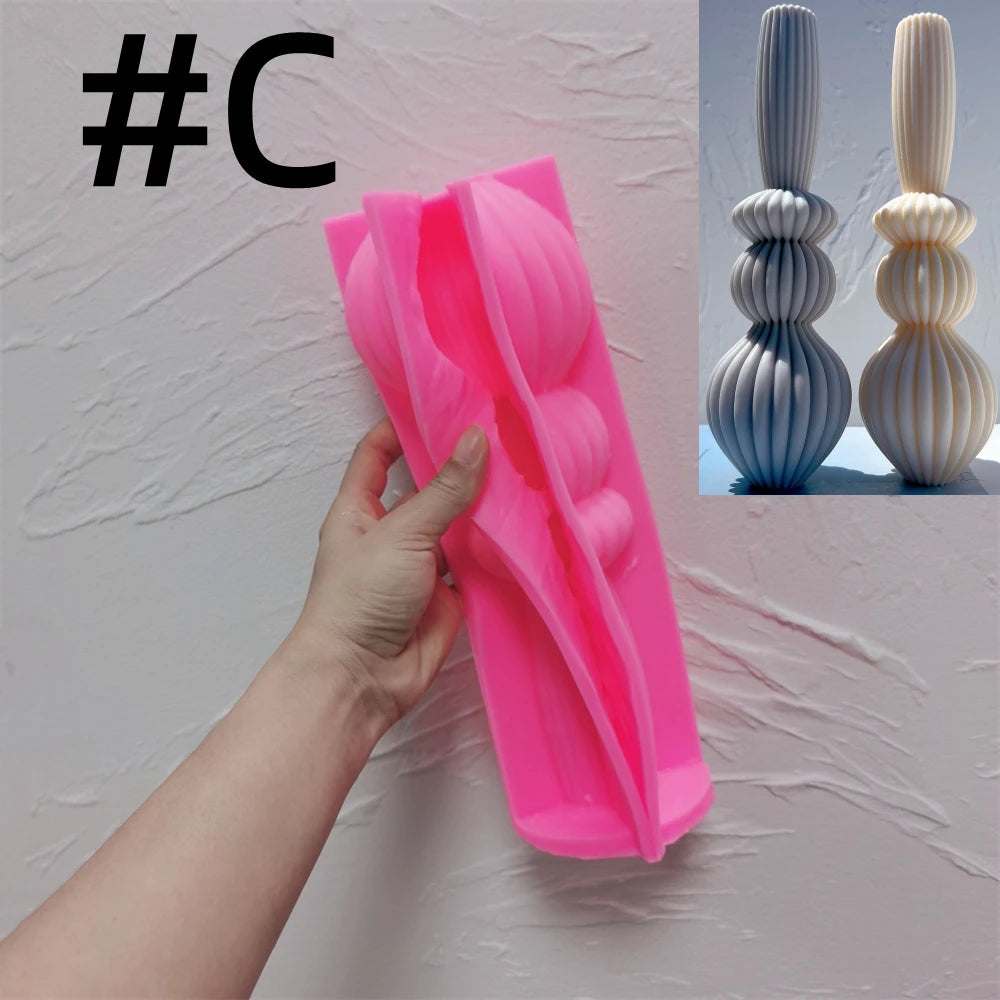 Pink C mold with rounded-base candle examples