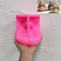 Pink silicone mold for rounded seated hedgehog with casting sample image