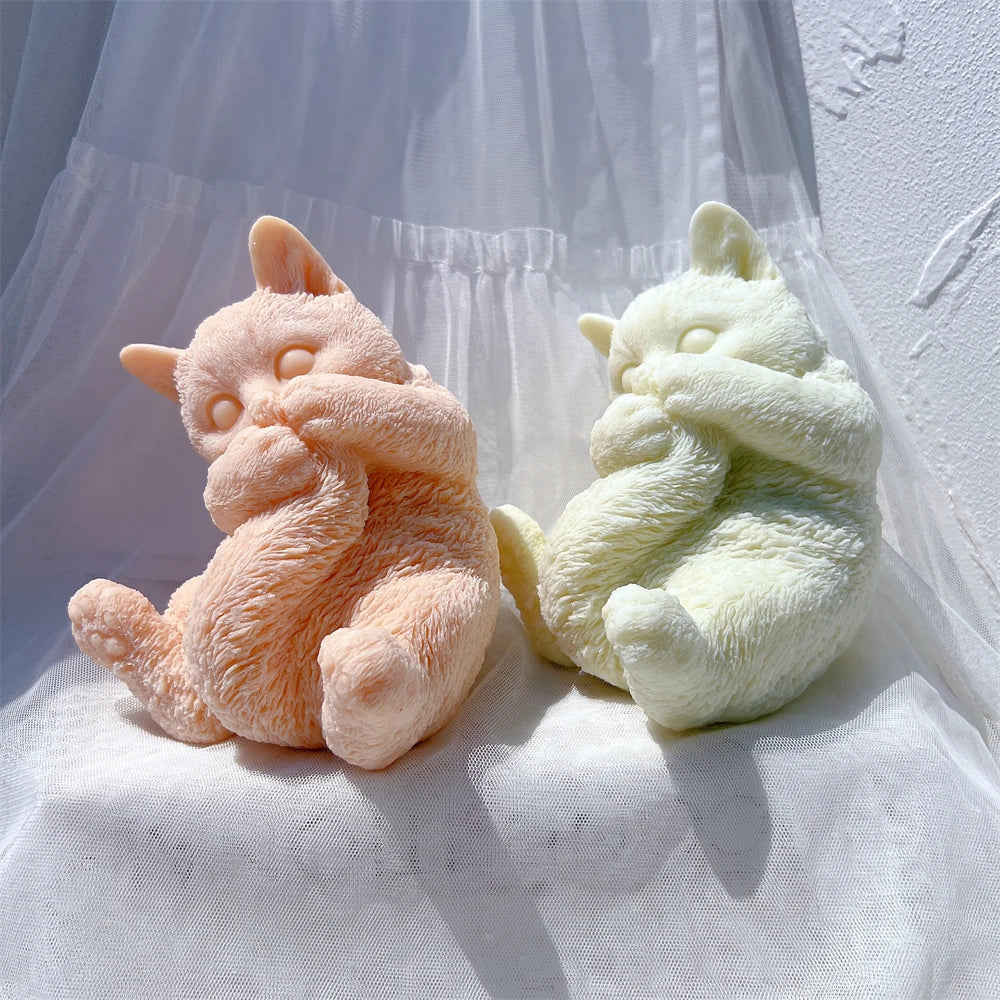 Angled cat figures showing curled tails and paw details