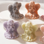 Pastel angel candle samples viewed from the front and side