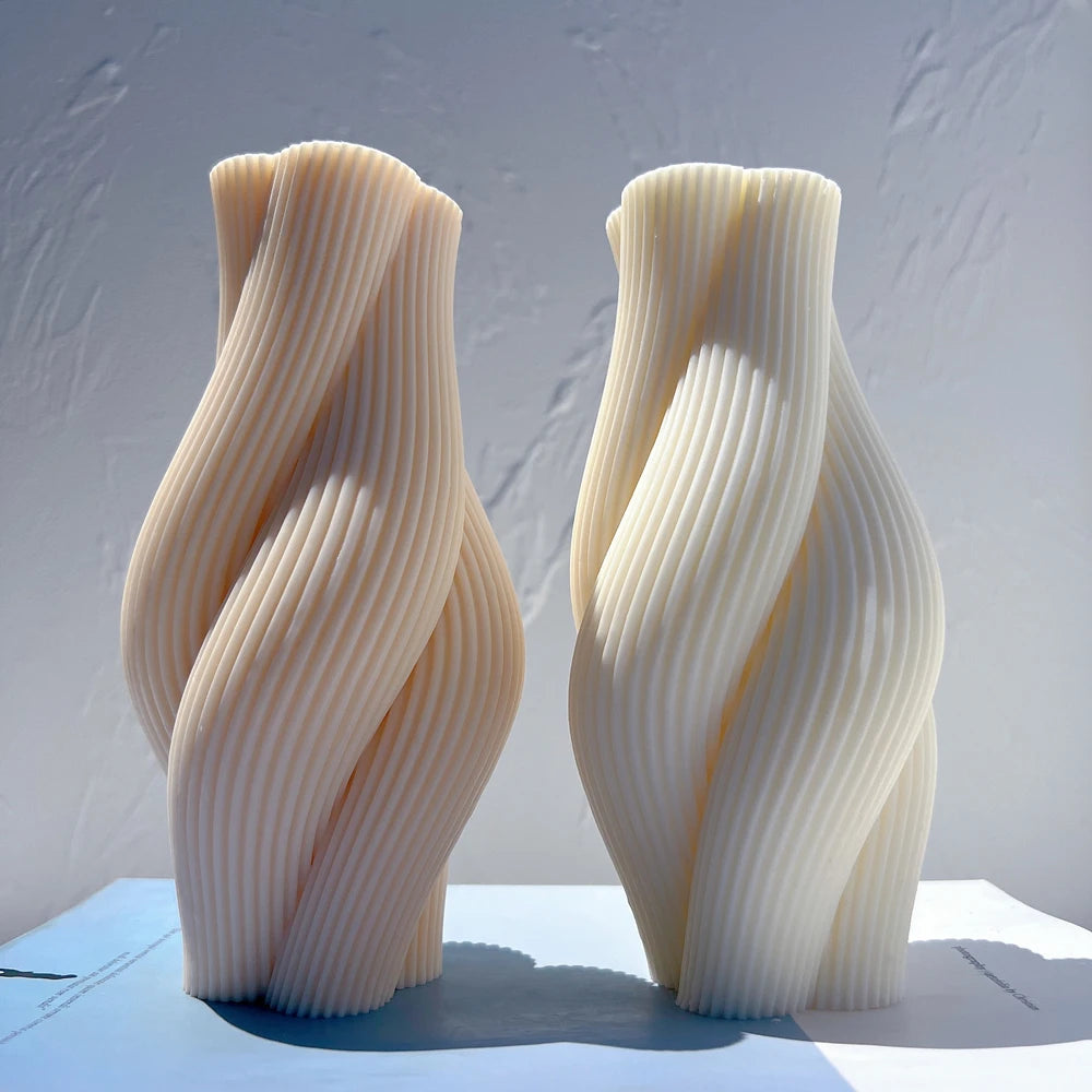 Peach and cream fine-ribbed twisted pillar castings