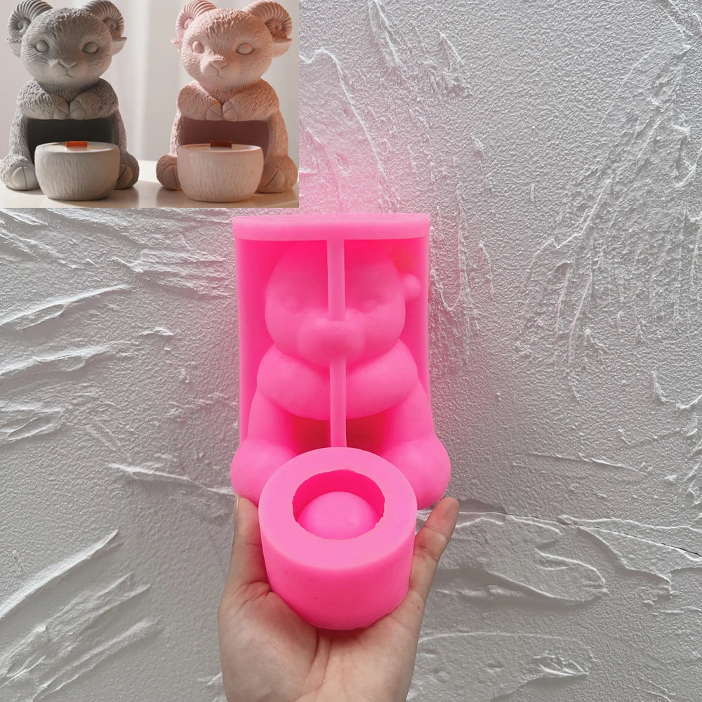 Pink silicone ram and cup holder mold beside finished casting examples