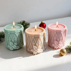 Top angled view of round Christmas drum castings with wicks