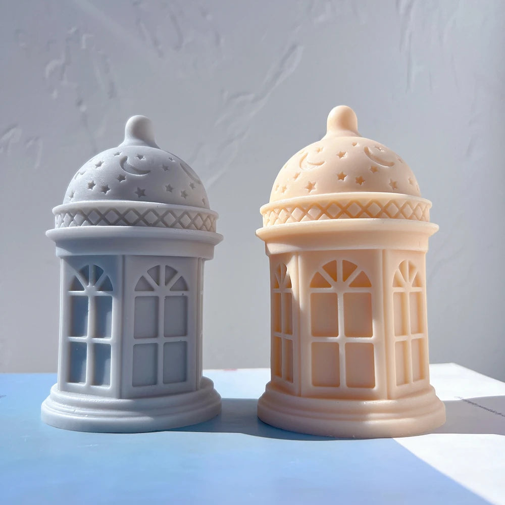 Gray and peach lantern castings showing domes and curled finials