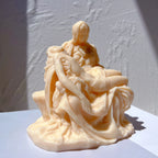 Angled Pietà sculpture casting with detailed drapery