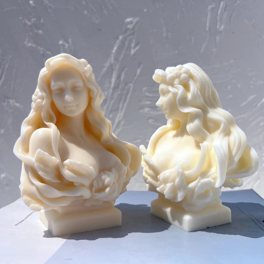 Woman bust castings with floral wraps and flowing hair