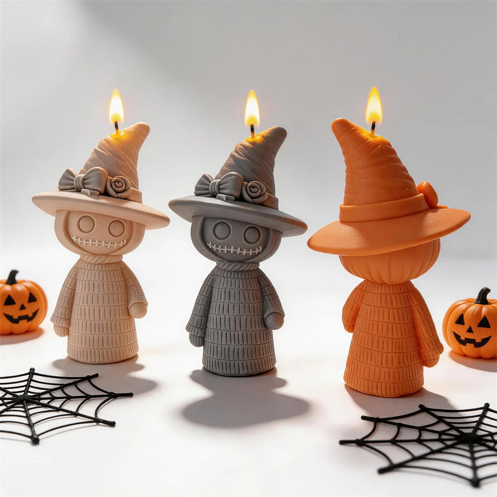 Front and rear views of textured witch figurines
