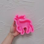 Pink silicone mold for one standing antlered reindeer candle