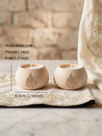 Round candle holder castings with flame relief and size notes