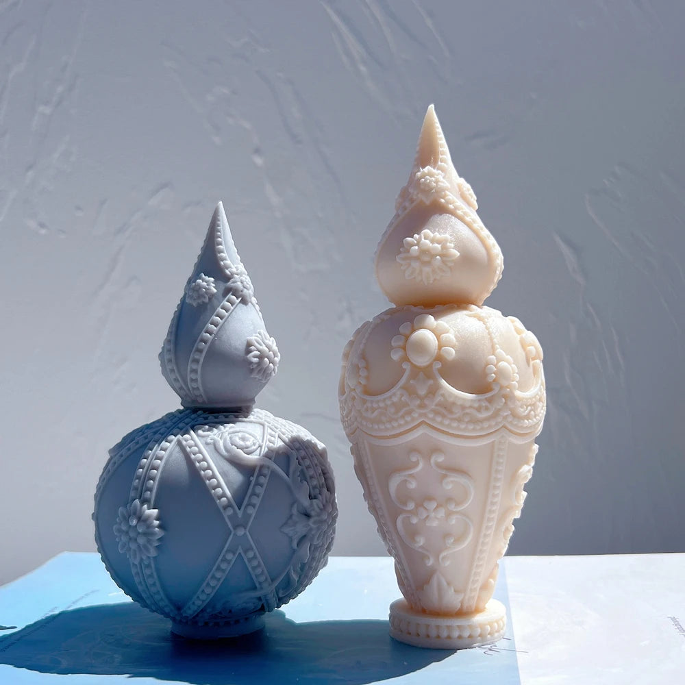 Beaded Globe B beside Pointed Urn A casting samples