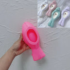 Pink silicone seal holder mold with recessed oval cavity
