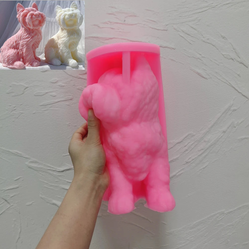 Pink silicone Yorkshire terrier mold held in one hand