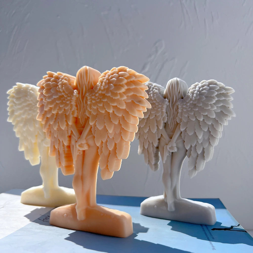 Three winged figures standing on integrated bases