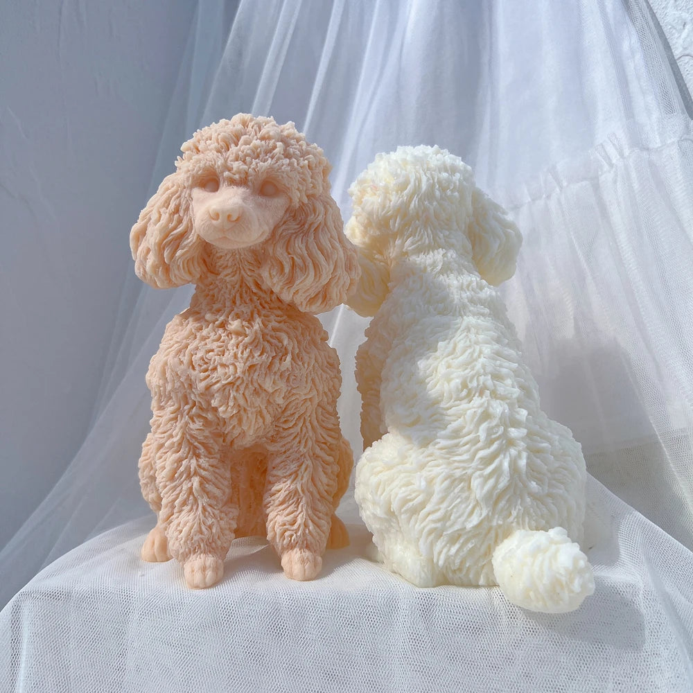 Poodle figurine castings showing paws and a curled tail