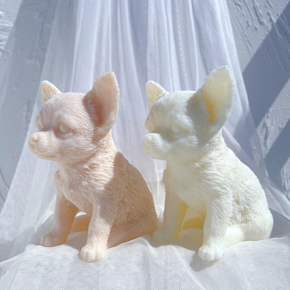 Two big-eared puppy castings viewed from the side