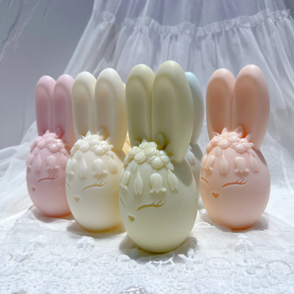 Front view of flower-crowned bunny eggs with smooth upright ears