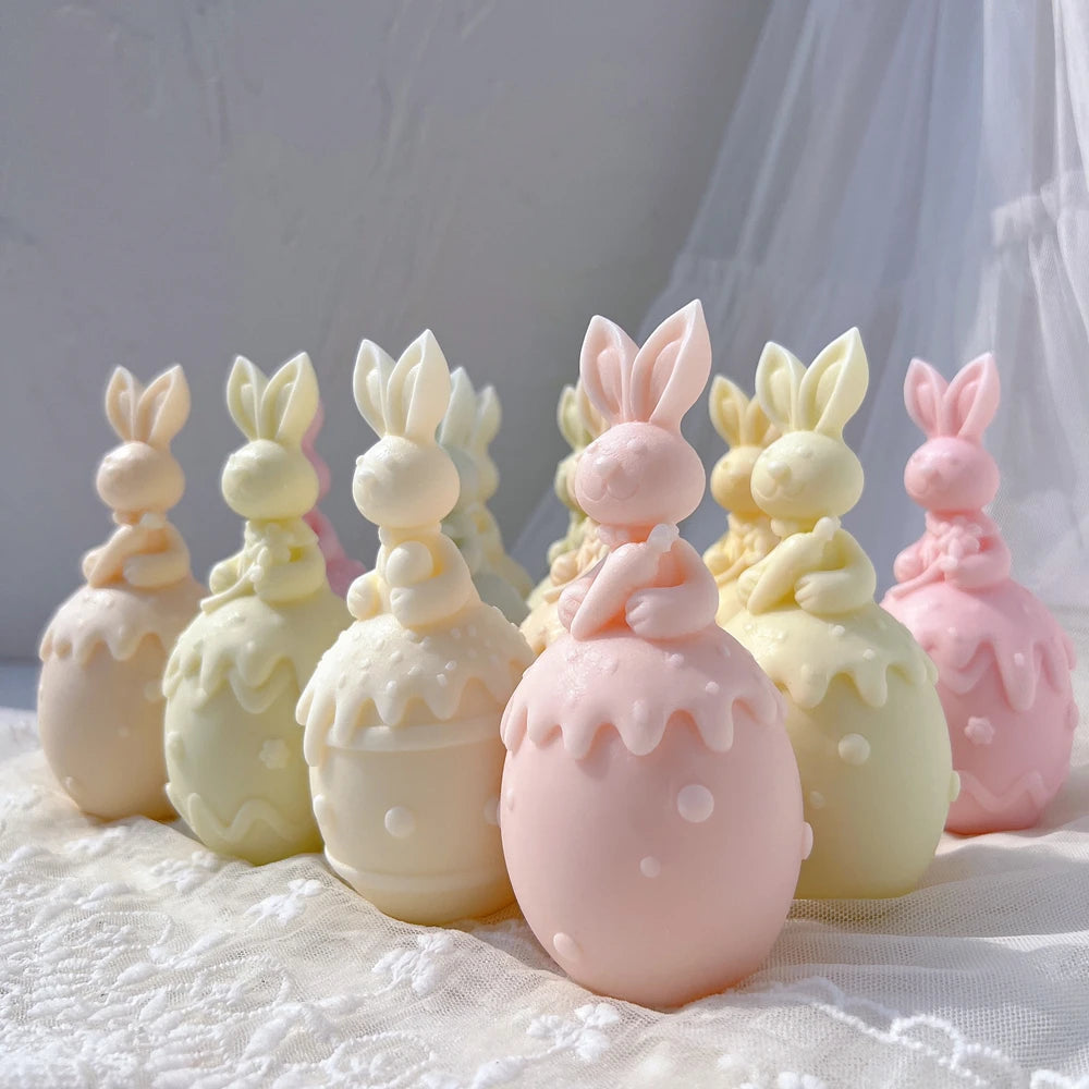 Three bunny-topped Easter egg designs displayed in pastel colors