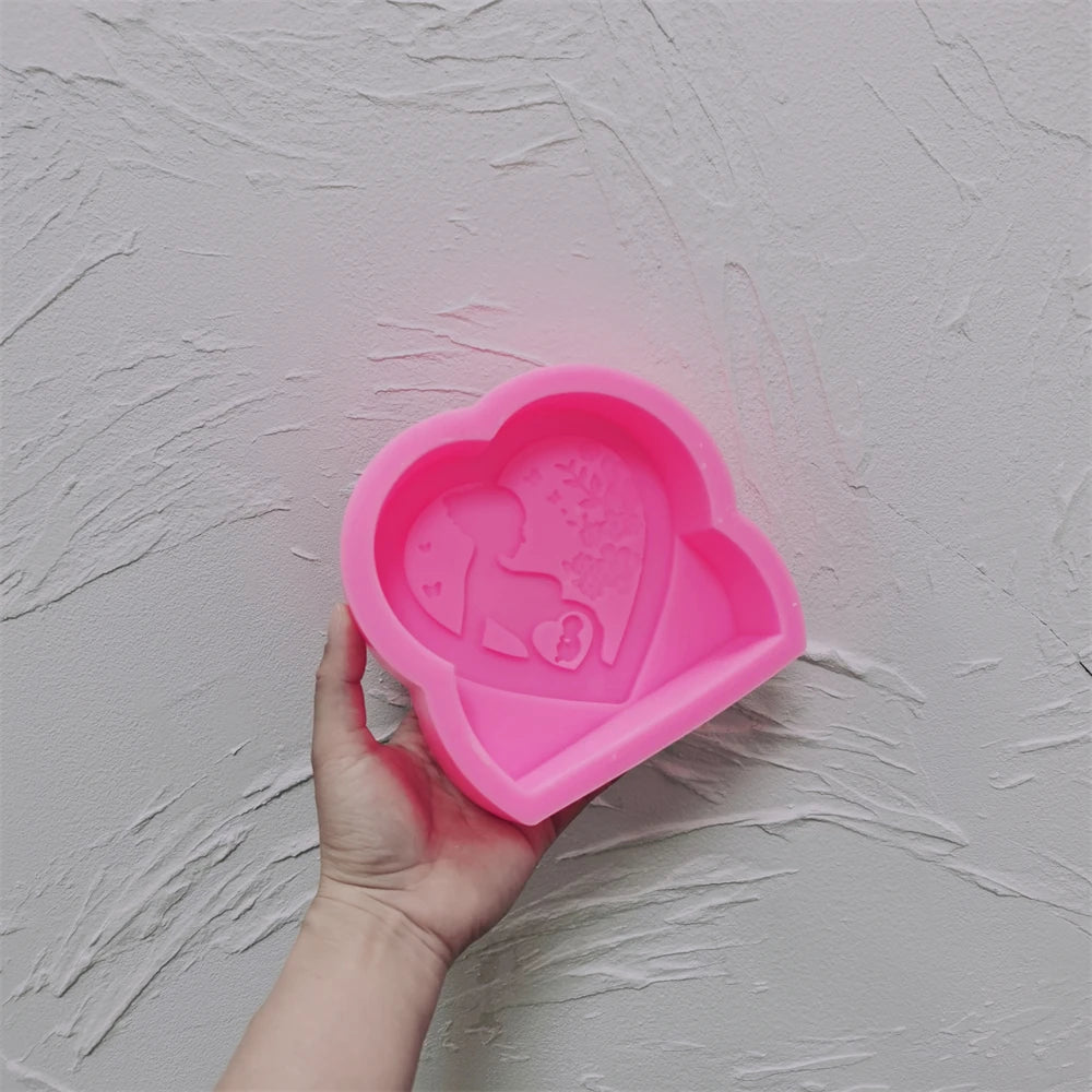 Pink silicone heart pregnancy silhouette mold