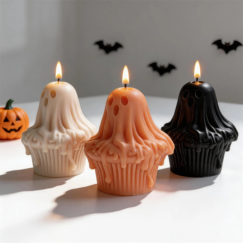 Cream, orange and black ghost cupcake candle examples
