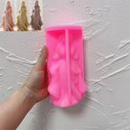 Pink silicone mold for woman wearing a long flowing gown