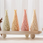 Front view of pastel conical trees with allover ribbon bows