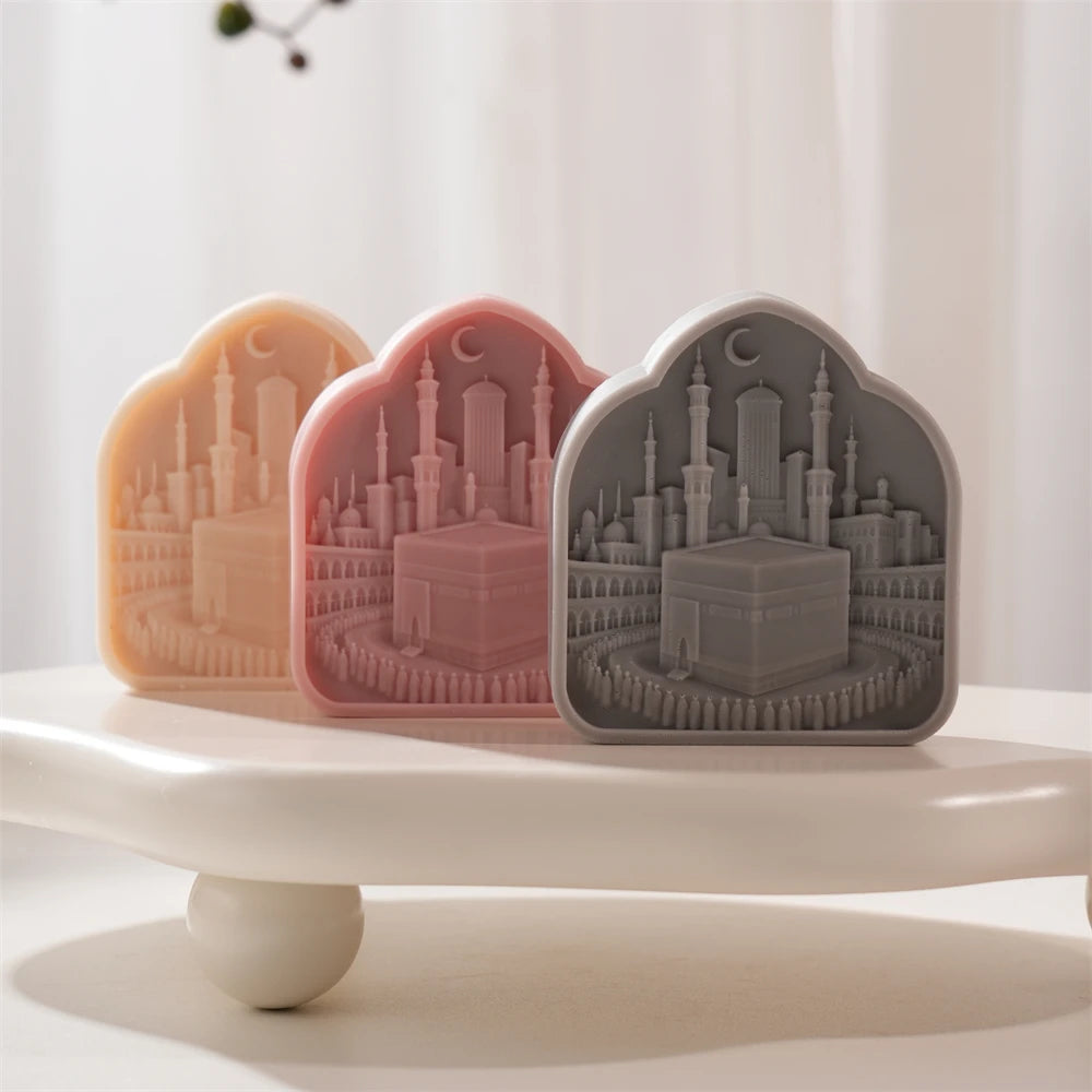 Arched Kaaba relief castings with crescent and skyline backdrop