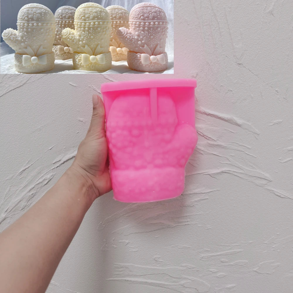 Pink silicone mold for mitten with rounded top and thumb