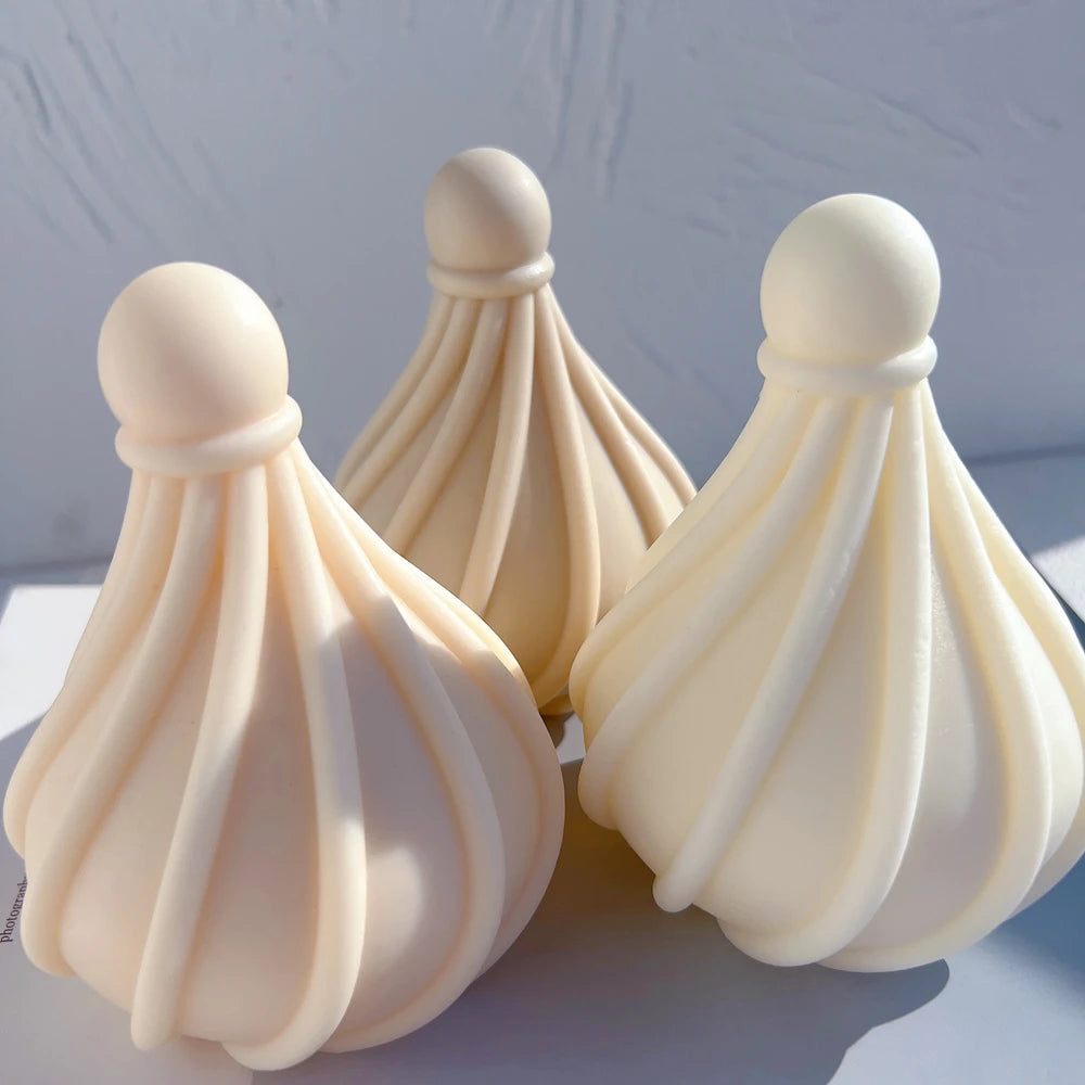 Angled group of spiral droplets showing their narrow necks